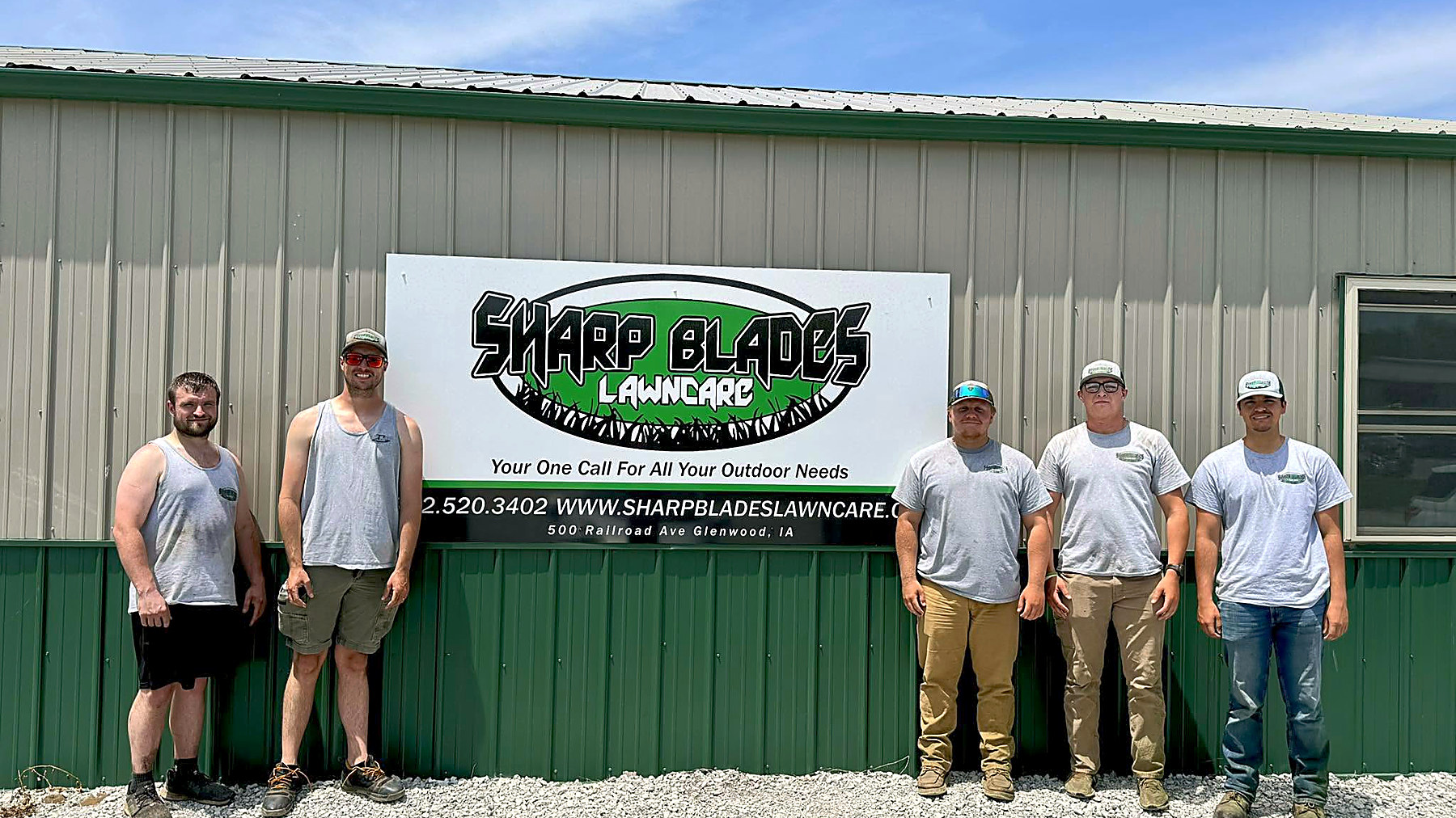 The Sharp Blades crew outside the company shop on Railroad Avenue in Glenwood